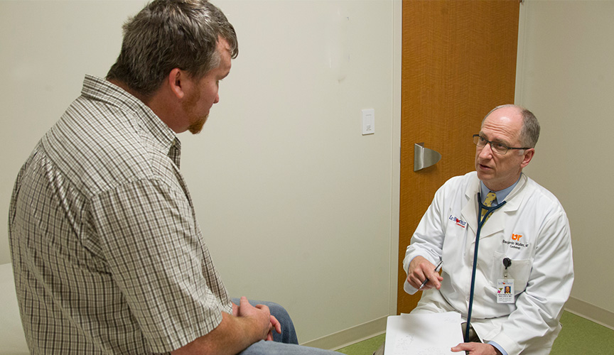 Dr. Waller meets a patient in Adult Congenital Heart Disease Clinic.